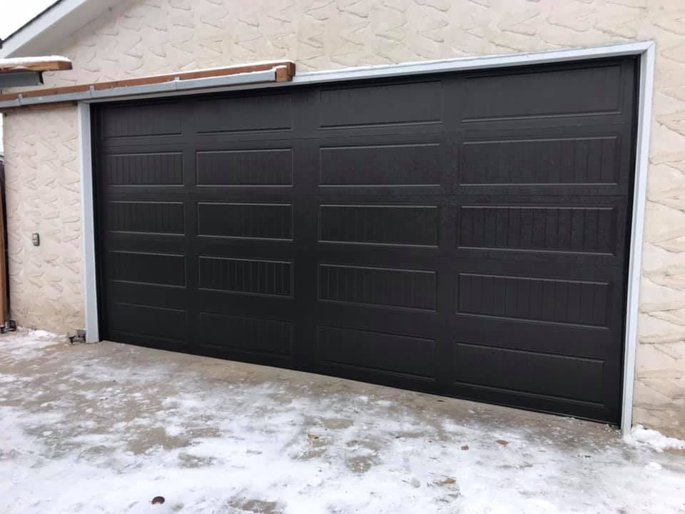 Beautiful new black garage door